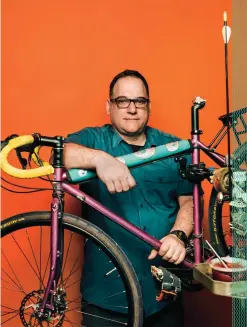  ??  ?? RIDE ON Joe Nocella, founder of 718 Cyclery, seen here with a Surly Straggler bike frame.