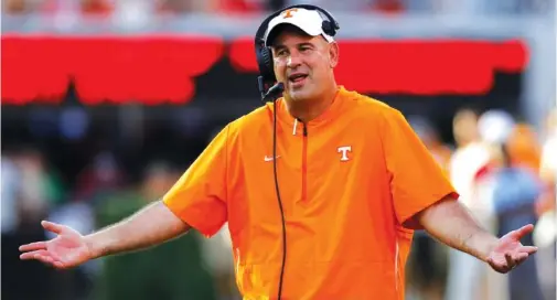  ?? STAFF PHOTO BY C.B. SCHMELTER ?? Jeremy Pruitt reacts during a game against Georgia at Sanford Stadium in 2018. Pruitt was fired as head football coach at Tennessee on Monday.