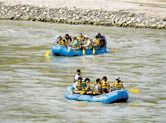  ?? WILDCOAST ?? Rafters paddle down the Copalita River, which is considered one of Mexico’s best white-water rafting rivers. The rapids originate in the Sierra Madre Mountains.