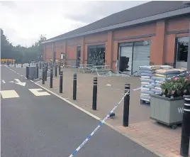  ??  ?? Pictured is the scene at Waitrose in Granite Way, Mountsorre­l after thieves attempted to steal a cash machine.