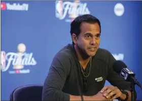  ?? AP PHOTO/DAVID ZALUBOWSKI ?? Miami Heat head coach Erik Spoelstra responds to a question at a news conference before practice for Game 2 of the NBA Finals, Saturday, June 3, 2023, in Denver.