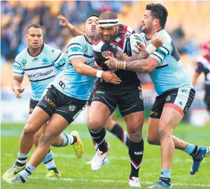  ?? Picture / Getty Images ?? The Sharks had their hands full containing Manu Vatuvei at Mt Smart.