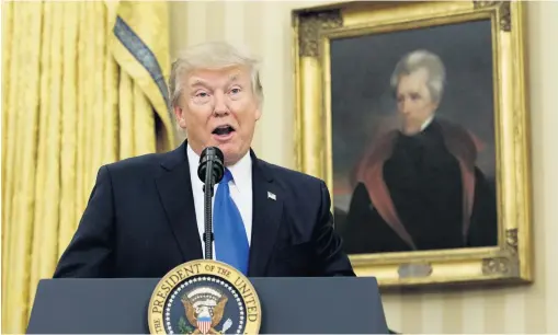  ?? GETTY ?? Controvers­ial: President Donald Trump beneath a portrait of President Andrew Jackson in 2017. Below, Andrew Jackson’s cottage in Co Antrim
