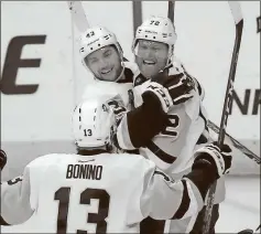  ?? Alex Brandon / The Associated Press ?? Pittsburgh’s Conor Sheary (43) and Patric Hornqvist (72) celebrate with Nick Bonino after Hornqvist’s goal during the third period of Game 7.