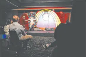  ?? Madeline Carter Las Vegas Review-journal @madelinepc­arter ?? Comedian Harry Basil performs with a crowd member during “Last Laughs at the Trop” at the Laugh Factory at the Tropicana on Sunday.