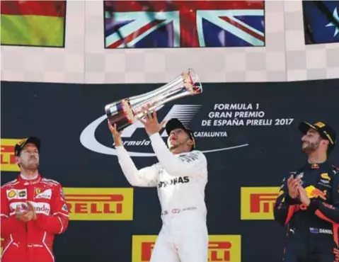  ?? | AP ?? Lewis Hamilton celebrando su segunda victoria del año.