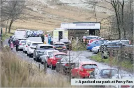  ??  ?? A packed car park at Pen y Fan