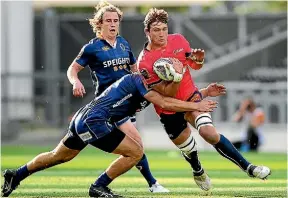  ??  ?? Tasman’s Ethan Blackadder charges upfield yesterday.