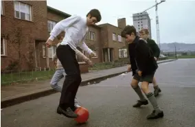  ?? ?? Street style: George Best, football’s first fashion icon, photograph­ed in Belfast, circa 1967