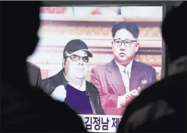  ?? AHN YOUNG-JOON/ THE ASSOCIATED PRESS ?? A TV screen shows pictures Tuesday of North Korean leader Kim Jong Un and his older brother Kim Jong Nam, left, at the Seoul Railway Station in Seoul, South Korea. Kim Jong Nam was assassinat­ed at an airport in Kuala Lumpur, Malaysia.