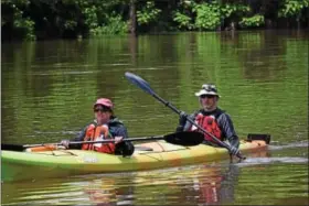  ?? MARIAN DENNIS – DIGITAL FIRST MEDIA ?? A pair in a double kayak participat­e in the fifth day of the Schuylkill River Sojourn. Paddlers stopped for lunch in Royersford before continuing to Mont Clare in the evening.