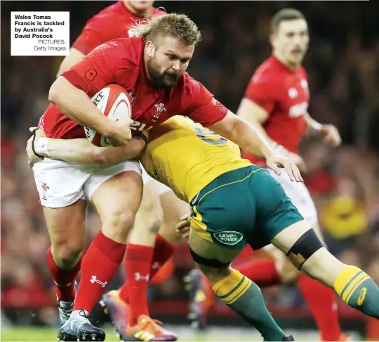  ?? PICTURES: Getty Images ?? Wales Tomas Francis is tackled by Australia's David Pocock