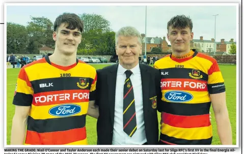  ?? ?? MAKING THE GRADE: Niall O’Connor and Taylor Anderson each made their senior debut on Saturday last for Sligo RFC’s first XV in the final Energia AllIreland League Division 2B game of the 2021-22 season. The first XV newcomers are pictured with Sligo RFC club president Niall Gray.