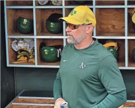  ?? MATT KARTOZIAN/USA TODAY SPORTS ?? Athletics manager Mark Kotsay looks on prior to a spring training game against the Angels on March 6 in Tempe, Ariz.