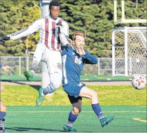  ?? PHOTO SPECIAL TO THE GUARDIAN BY MIKE BERNARD ?? Ibra Sanoh, middle, of the Holland College Hurricanes men’s soccer team battles for a loose ball with a Mount Saint Vincent defender in ACAA action on Saturday in Cornwall.