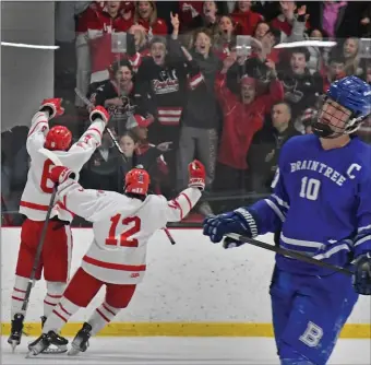  ?? CHRIS CHRISTO — BOSTON HERALD ?? Canton, MA - March 4, 2024: Hingham Celebrates a goal against Braintree.