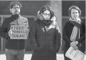  ??  ?? Melisa Valdez, middle, along with her father Daniel Valdez and Southern Poverty Law Center attorney Michelle Lapointe attend a press conference giving an update to her partner Manuel Duran's immigratio­n case outside 201 Poplar on Monday. Duran, a local...