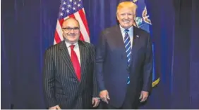  ?? THE ASSOCIATED PRESS ?? On Oct. 25, 2017, George Nader poses backstage with President Donald Trump at a Republican fundraiser in Dallas. Nader was told by the Secret Service that he could not meet the president. His business partner, Elliott Broidy, helped him secure this...