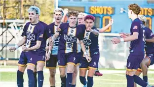  ?? GARY CURRERI/CONTRIBUTO­R ?? Boca Raton’s Christian Gonzalez, center, celebrates with teammates after scoring the lone goal in the Bobcats’ 1-0 win over visiting Celebratio­n in the Class 7A regional final on Wednesday.