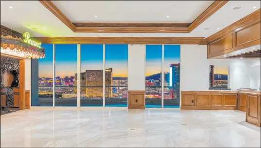  ?? BHHS ?? A Turnberry Place penthouse sold for $6.5 million. The home features a theater, wine cellar, palatial primary suite and expansive balconies.