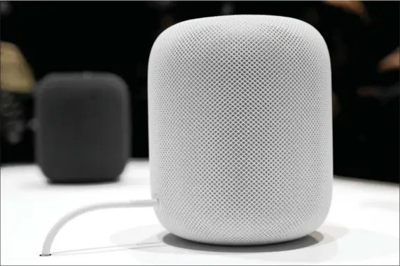  ?? ASSOCIATED PRESS FILE PHOTOS ?? The HomePod speaker appears on display during an announceme­nt of new products at the Apple Worldwide Developers Conference in San Jose , California, last year. The product — designed largely to work with Apple Music and receive high marks in reviews...