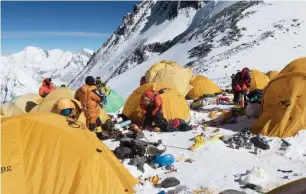 ?? AFP ?? Discarded climbing equipment and rubbish scattered around Camp 4 of Mount Everest. —
