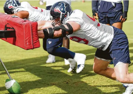  ?? Brett Coomer / Staff photograph­er ?? Texans defensive end J.J. Watt is happy to be back on the field again after being injured most of the past two seasons and says he’s “just controllin­g what I can control.”