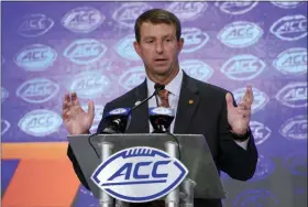  ?? CHUCK BURTON — THE ASSOCIATED PRESS ?? Clemson head coach Dabo Swinney speaks during the Atlantic Coast Conference NCAA college football media day in Charlotte, N.C., Wednesday.