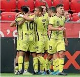  ?? GETTY IMAGES ?? Phoenix players celebrate David Ball’s second-half goal.