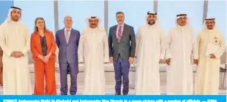  ?? — KUNA ?? KUWAIT: Ambassador Walid Al-Khubaizi and Ambassador Vice Skracic in a group picture with a number of officials.