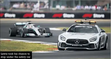  ??  ?? Lewis took his chance to stop under the safety car