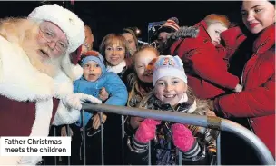  ??  ?? Father Christmas meets the children