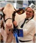  ?? ?? Justina Langley, left, with champion Holstein calf Valebrook Dumble Holly; above, Heather Limond with reserve champion Holstein