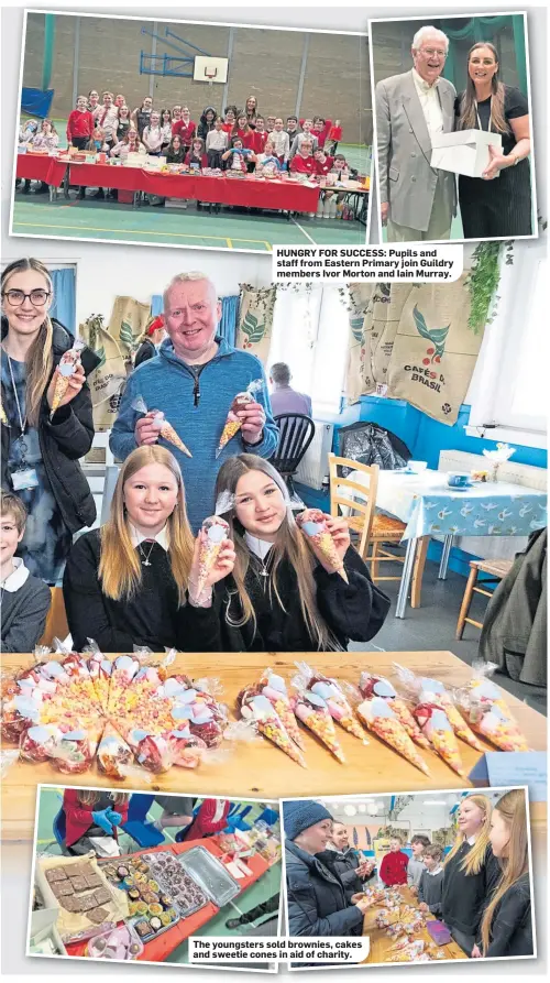  ?? ?? HUNGRY FOR SUCCESS: Pupils and staff from Eastern Primary join Guildry members Ivor Morton and Iain Murray.
The youngsters sold brownies, cakes and sweetie cones in aid of charity.