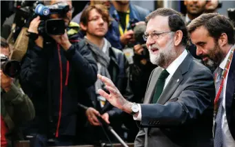  ??  ?? Spain’s Prime Minister Mariano Rajoy arrives at a European Union leaders summit in Brussels