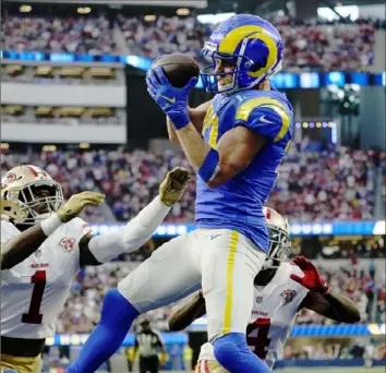  ?? Marcio Jose Sanchez/Associated Press ?? Cooper Kupp is only the fourth player to win receiving’s triple crown in an NFL season and is a big reason the Rams play for the NFC championsh­ip this afternoon.