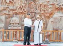  ?? AP ?? ■
Prime Minister Narendra Modi with Chinese President Xi Jinping in Mamallapur­am, Tamil Nadu, where the duo held informal talks in October.