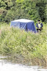  ?? PHOTOS: GERRY MOONEY ?? Remanded in custody: Robert Broughan outside Naas Courthouse yesterday. Above, the scene where Roy Hopkins (inset below) was found badly injured.