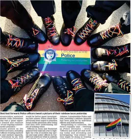  ??  ?? Best foot forward: Police officers tweet a picture of their rainbow laces yesterday Flying the flag: City Hall in London