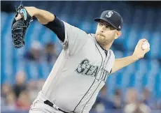  ?? FRED THORNHILL/THE CANADIAN PRESS ?? Seattle pitcher James Paxton, from Ladner, threw a no-hitter against the Blue Jays on May 8.