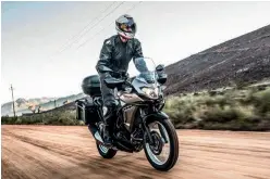  ??  ?? clockwise from above Versys-x 300 is a good-looking machine; ABS brakes and spoked wheels are standard; analogue/digital is easy to read and displays important informatio­n at a quick glance; styling belies the small displaceme­nt.