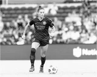  ?? MARK THOR/COURTESY ?? Orlando Pride co-captain Ali Krieger dribbles the ball during a match against the Portland Thorns at Exploria Stadium.