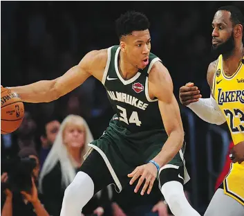  ?? DR ?? Gianni Antetokoun­mpo (Bucks) e Lebron James (Lakers) são dois dos atletas mais mediáticos