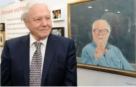  ?? ALEX HANNAM ?? FLASHBACK: Sir David with a painting of his brother at the official opening the gallery extension at Attenborou­gh Arts Centre