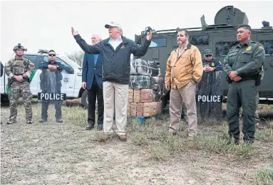  ?? JIM WATSON AFP/GETTY IMAGES ?? Donald Trump’s wall plan is part of what journalist Alan Rusbridger calls “the flight from complexity” that defines this era.