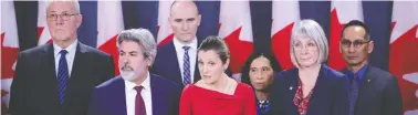  ?? SEAN KILPATRICK / THE CANADIAN PRESS FILES ?? Let's just say that Public Safety Minister Bill Blair, from left, Government House Leader Pablo Rodriguez, Treasury Board President Jean-yves Duclos, Deputy Prime Minister Chrystia Freeland, Canada's chief public health officer Dr. Theresa Tam, Health Minister Patty Hajdu and Dr. Howard Njoo have lacked
precision in the totality of their public statements about COVID-19, Chris Selley writes.