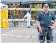  ?? ?? Police in Oslo outside scene of shootings