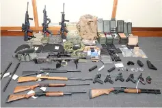  ??  ?? A cache of guns and ammunition uncovered by US federal investigat­ors in the home of Hasson in Silver Spring, Maryland, US. — Reuters photo