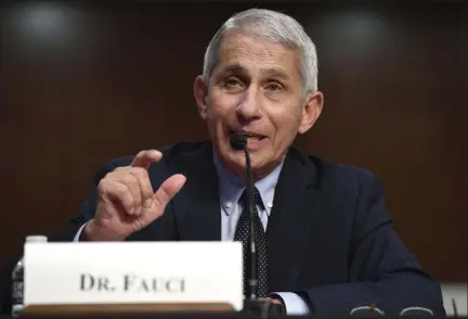  ?? KEVIN DIETSCH — ASSOCIATED PRESS ?? Dr. Anthony Fauci, director of the National Institute for Allergy and Infectious Diseases, testifies Tuesday before a Senate Health, Education, Labor and Pensions Committee hearing on Capitol Hill in Washington.