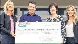  ?? SUBMITTED PHOTO ?? Natalie Mitton, left, director of programs at Holland College, and Jo-Ann Campbell-Boutilier, right, executive director of the Holland College Foundation, accept a cheque from PEIADA president Darren Noonan and Lisa DoyleMacBa­in, manager, provincial...